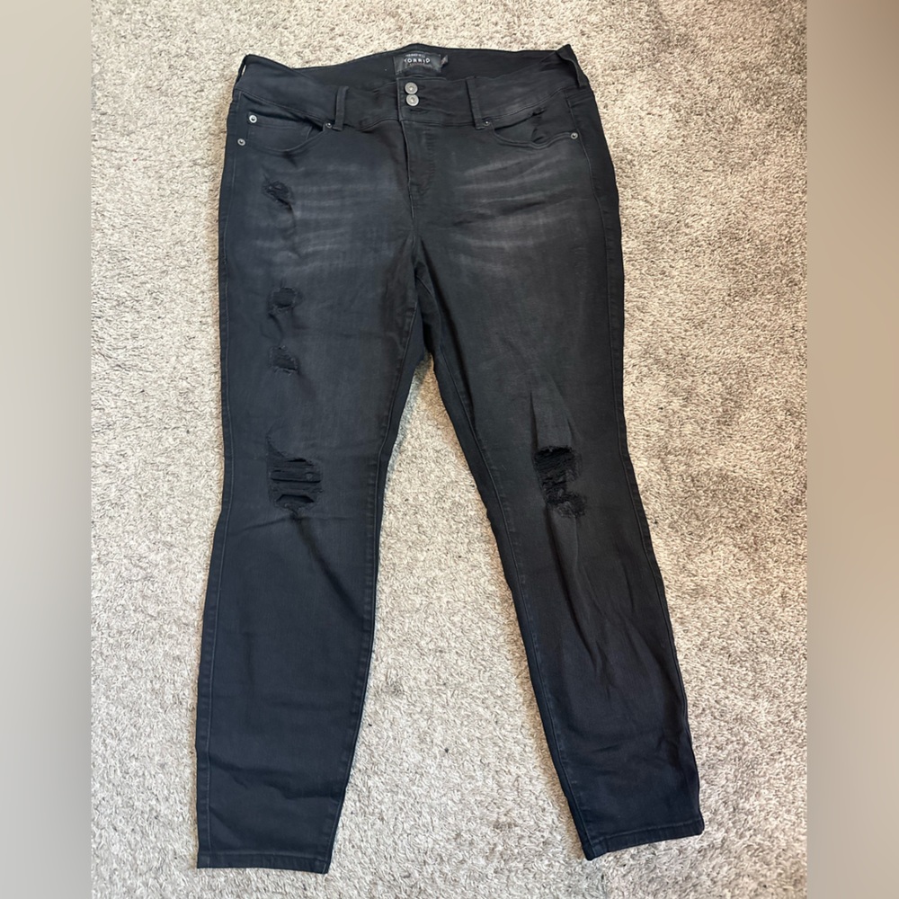 Ripped skinny black jeans.